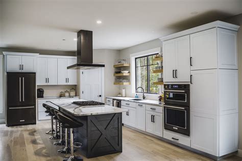 black stainless steel kitchen white cabinets square island|black cabinets with white base.